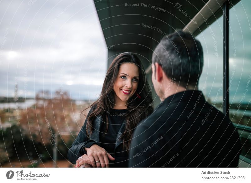 Adult couple standing on balcony Couple Adults Stand Balcony Woman Man Together Love Cheerful Flirt Lifestyle Romance Human being Beautiful romantic 2 Happy