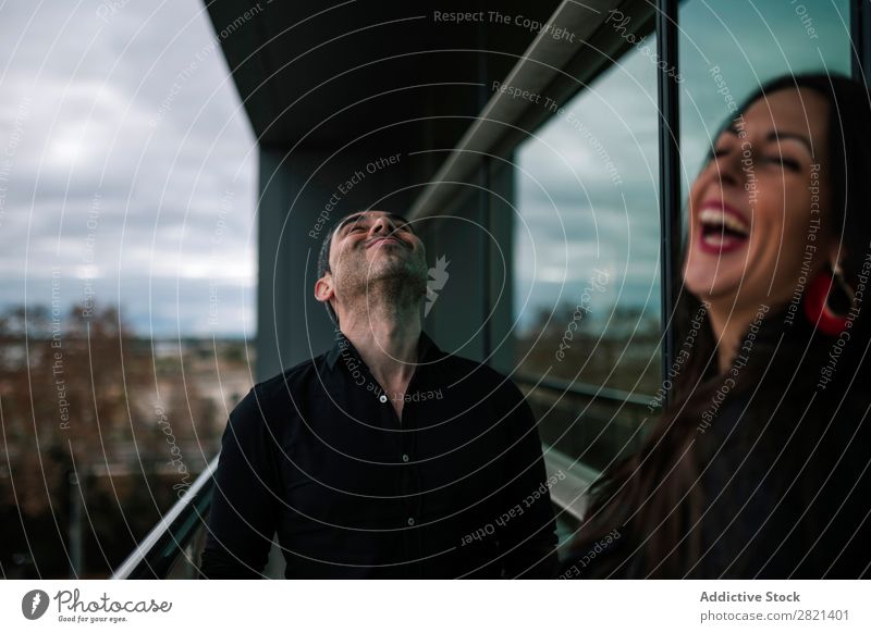 Adult couple standing on balcony Couple Adults Stand Balcony Woman Man Together Love Cheerful Flirt Lifestyle Romance Human being Beautiful romantic 2 Happy