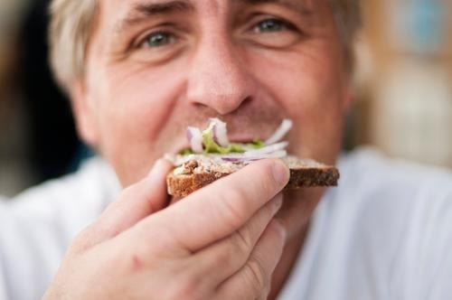 lard bread Food Lettuce Salad Bread Onion Nutrition Eating Lunch Buffet Brunch Human being Masculine Man Adults Life Face Eyes Nose Hand Fingers 1 45 - 60 years