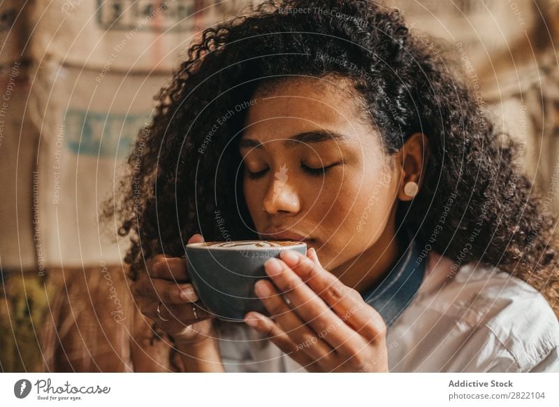 Woman drinking cup of coffee Beautiful Ethnic Black Youth (Young adults) African Stir Coffee Cup latte Brunette Attractive Human being Beauty Photography Adults