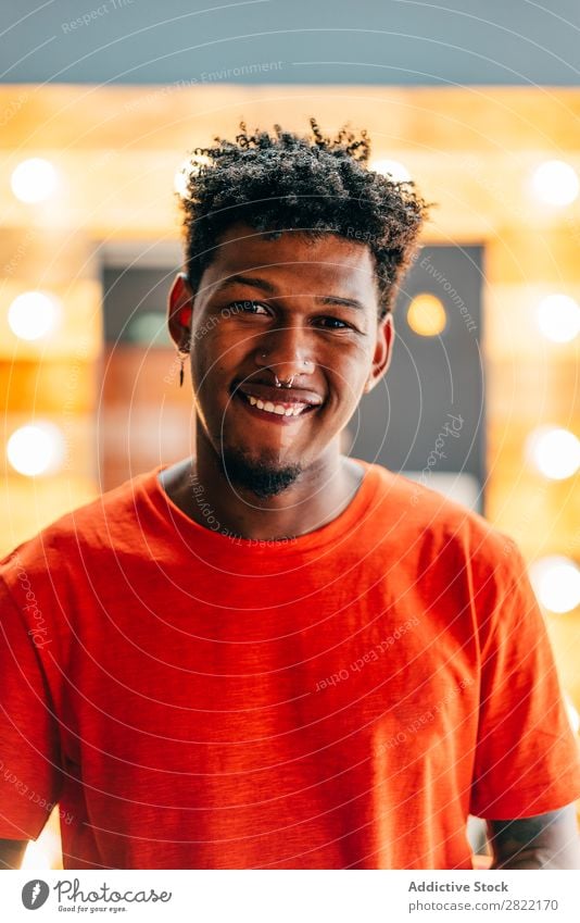 Hairdresser posing in barbershop Barber shop hair dress salon shaka Sign Gesture Looking into the camera Black Youth (Young adults) Man Hair Stylist