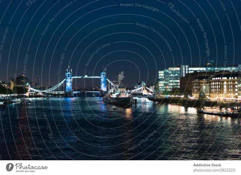 Glowing city embankment in night Skyline Embankment Tourism Bridge Town London Landmark England Light Architecture Vacation & Travel Night Structures and shapes