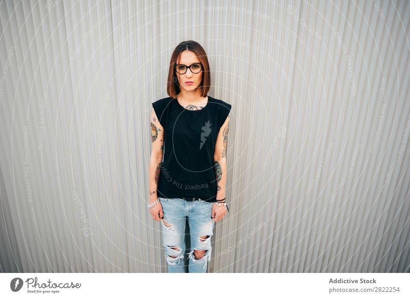 Stylish young woman standing at metal wall Woman Style Tattoo Street Beautiful Youth (Young adults) Fashion Hipster pretty Cool (slang) Beauty Photography