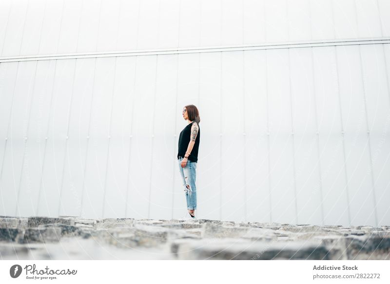 Young woman with tattoos standing on pavement Woman Style Tattoo Pavement Old Stand Street Beautiful Youth (Young adults) Fashion Hipster pretty Cool (slang)