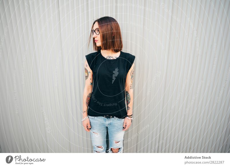 Stylish young woman standing at metal wall Woman Style Tattoo Street Beautiful Youth (Young adults) Fashion Hipster pretty Cool (slang) Beauty Photography