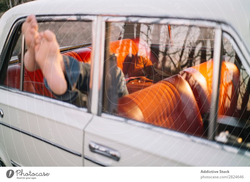 Man sleeping in vintage car Car Vintage Retro Sleep Lie (Untruth) Rest Relaxation Legs Hat White Vehicle Classic Old Adults Vacation & Travel Human being