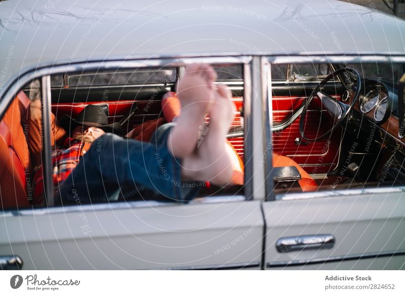 Man sleeping in vintage car Car Vintage Retro Sleep Lie (Untruth) Rest Relaxation Legs Hat White Vehicle Classic Old Adults Vacation & Travel Human being