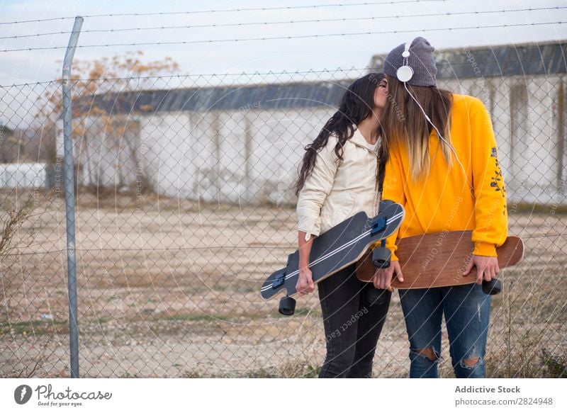 Two girls who play in the street with longboard Energy Woman Human being Leisure and hobbies Movement Tourist Happy Adventure Action Freedom Model Hip & trendy