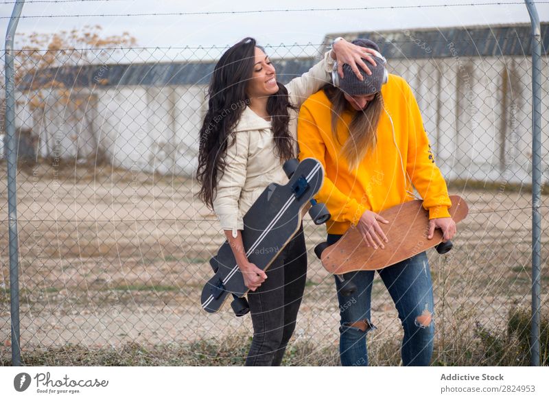 Two girls who play in the street with longboard Energy Woman Human being Leisure and hobbies Movement Tourist Happy Adventure Action Freedom Model Hip & trendy