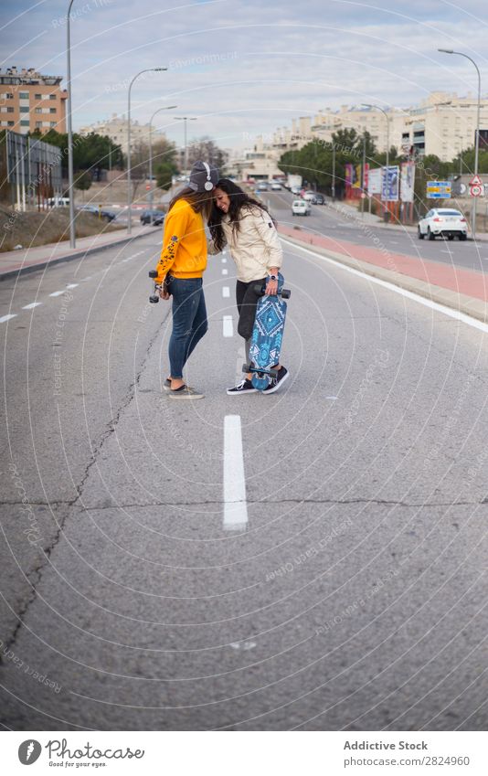 Two girls who play in the street with longboard Energy Woman Human being Leisure and hobbies Movement Tourist Happy Adventure Action Freedom Model Hip & trendy