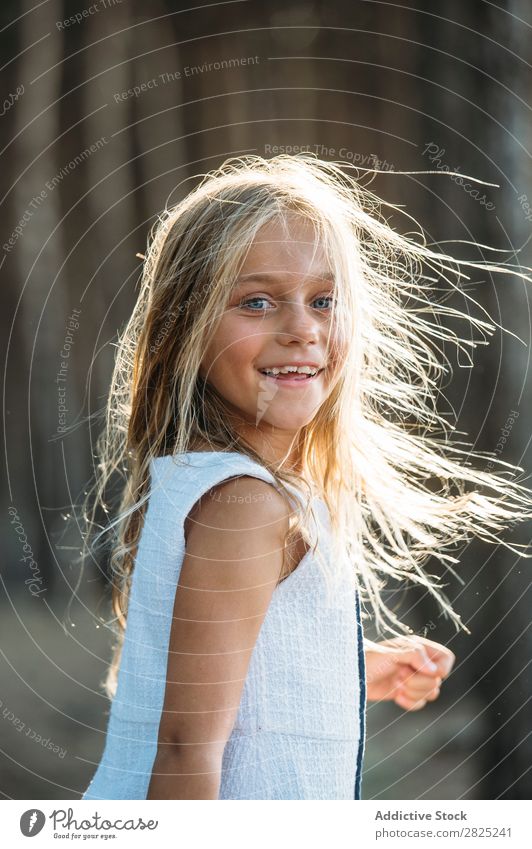 Adorable child posing happily Youth (Young adults) Self-confident Expression Copy Space Vertical pose Girl Joy Delightful Portrait photograph Playful Child