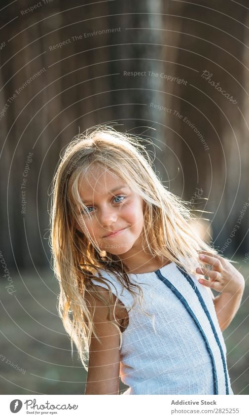 Lovely child in sunlight Girl Portrait photograph Posture Innocent Summer Expression Nature Purity Style hands crossed Child Delightful Fresh Sun Recklessness