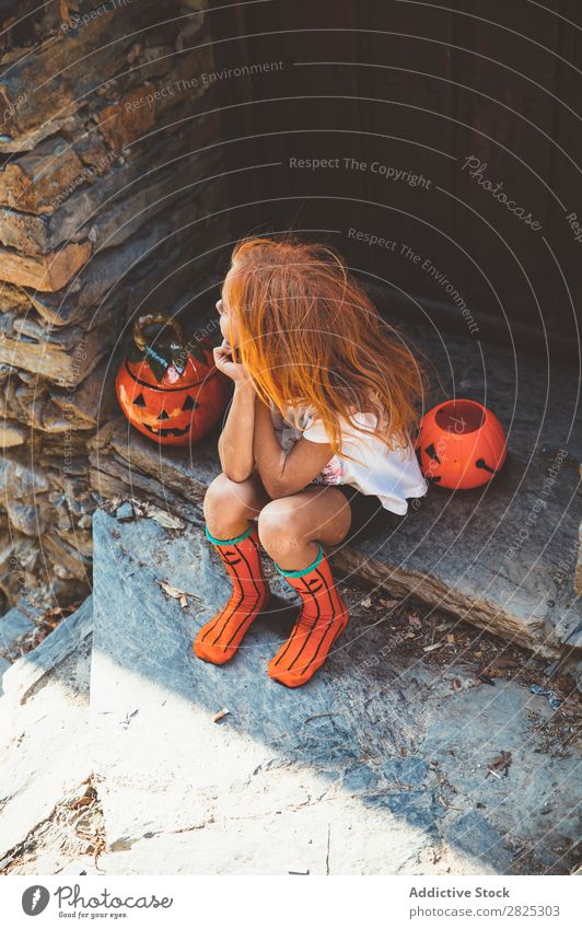 Charming sitting on porch Girl Veranda Hallowe'en Pumpkin Guest Tradition decor Design Vacation & Travel Autumn Festival Child Infancy Happiness