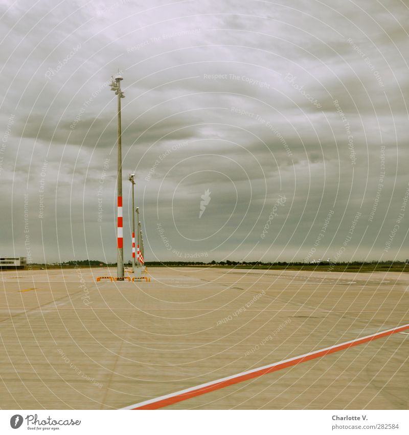 # 50: Full post with line Clouds Horizon Bad weather Outskirts Deserted Concrete Steel Line Stripe Signs and labeling Simple Gloomy Gray Red White Calm