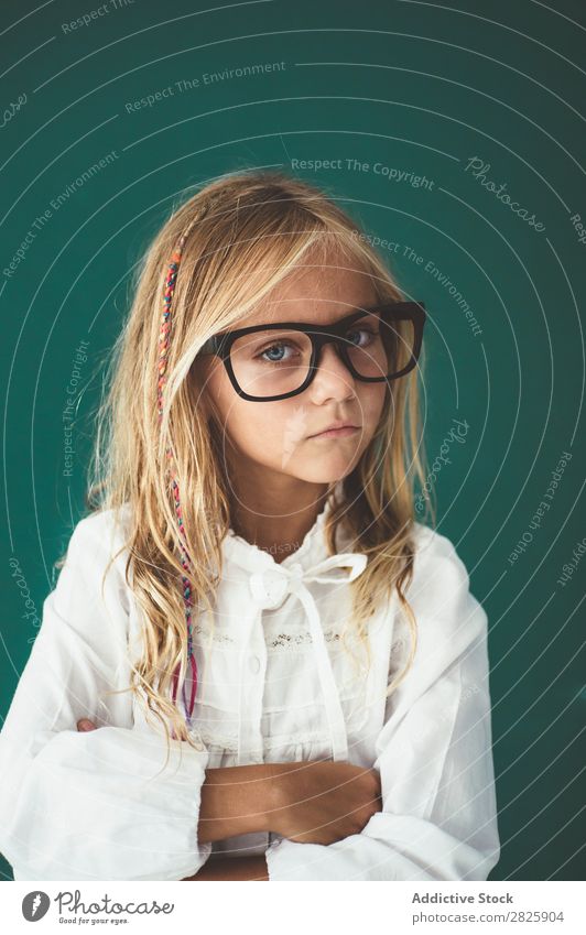 Cute schoolgirl posing in a classroom Girl Classroom Blackboard Person wearing glasses Cheerful Stand Education School Grade (school level) Student