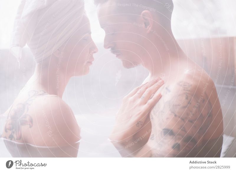 Sensual couple in plunge tub Couple Swimming Nature Winter Water Steam Woman Man Healthy Beautiful Vacation & Travel Romania Float in the water Snow Ice Natural