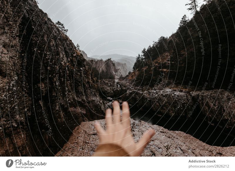 Male hand reaching out forward Man Hand Nature Mountain River Landscape Water Sky Beautiful Rock Stone Environment tranquil Wilderness Stream Lake Exterior shot