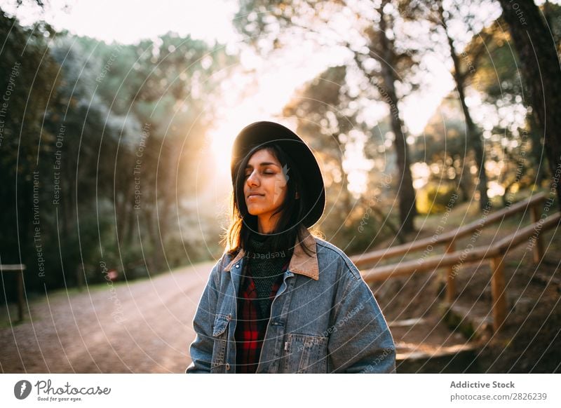 Woman with eyes closed on a road Tourist Forest Portrait photograph Street Autumn Rural Nature Relaxation Silent Youth (Young adults) pretty Cheerful Stand