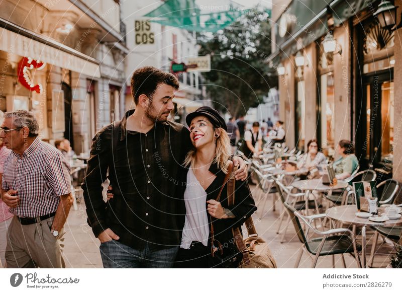 Happy couple walking on street Couple Street Walking Café City Youth (Young adults) Love Human being Lifestyle Woman Man Romance Together Smiling Relationship