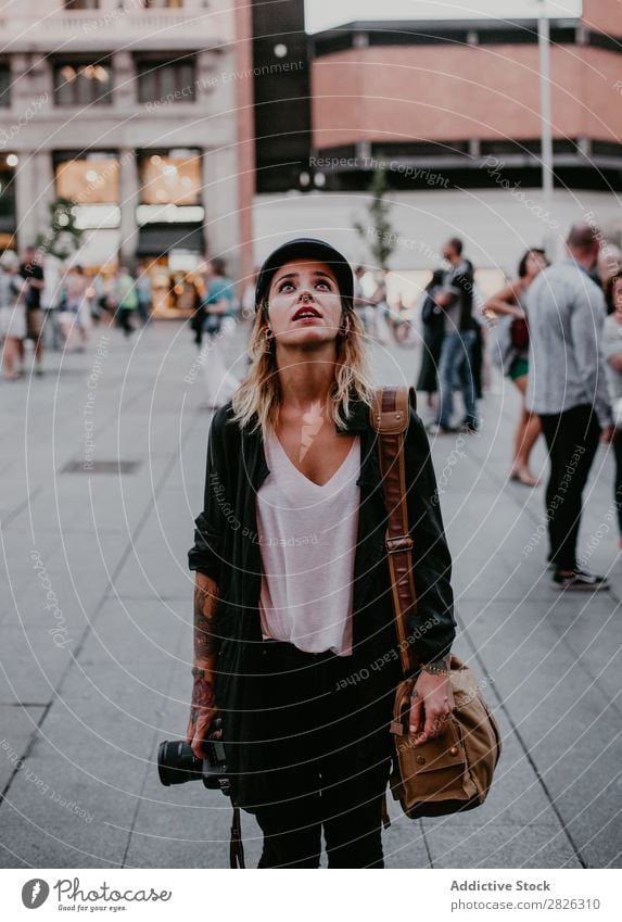 Woman with camera sightseeing Sightseeing Street Camera Photography City Youth (Young adults) Tourist Vacation & Travel Tourism Girl Town Beautiful Lifestyle