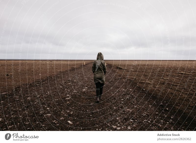 Person walking on cold desert Human being Desert Nature Vacation & Travel Landscape Iceland Street Tourism Walking Volcanic scenery North Natural Rock Cold