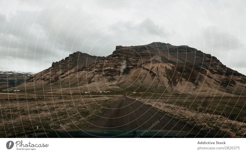 Mountains through glass Street Iceland Landscape Highway Nature Vacation & Travel Tourism scenery North Rock Natural Adventure Destination Bus Drive Reflection