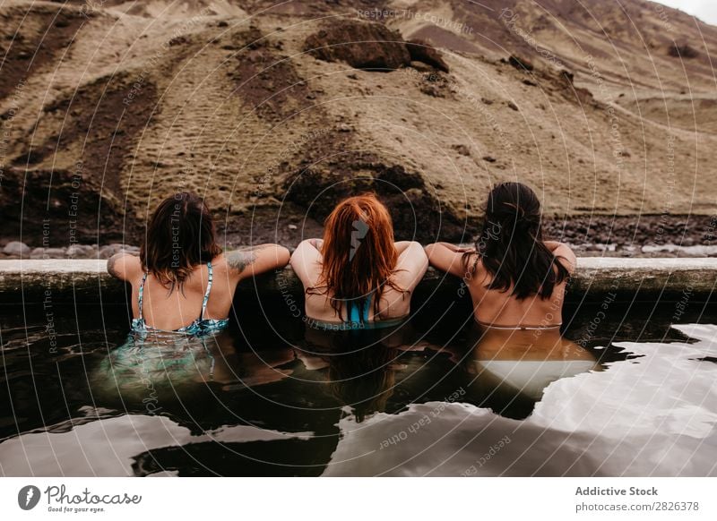 Three women in thermal spring Woman Iceland Relaxation Tourism Wellness Vacation & Travel Water Therapy Volcanic Resort Spa Healthy Hot Bathtub Natural