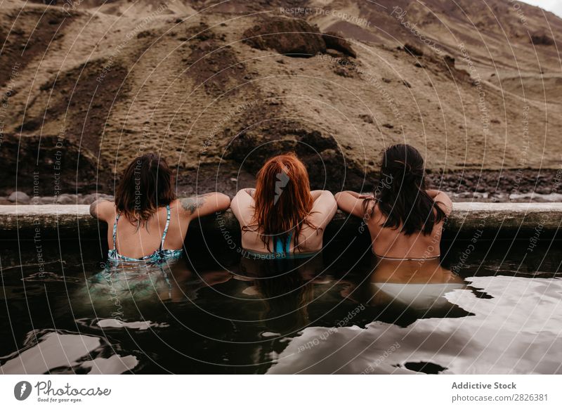 Three women in thermal spring Woman Iceland Relaxation Tourism Wellness Vacation & Travel Water Therapy Volcanic Resort Spa Healthy Hot Bathtub Natural