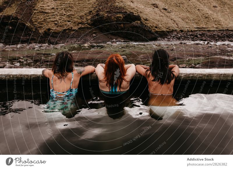 Three women in thermal spring Woman Iceland Relaxation Tourism Wellness Vacation & Travel Water Therapy Volcanic Resort Spa Healthy Hot Bathtub Natural