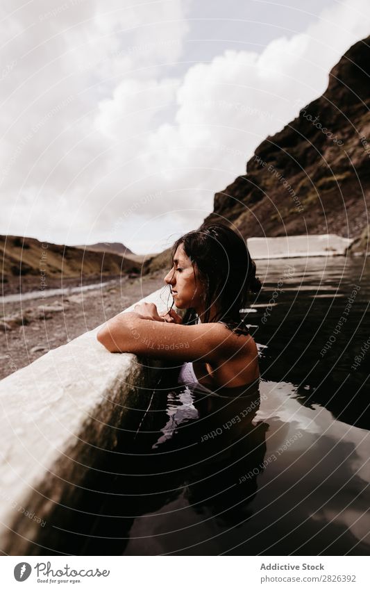 Woman relaxing in hot spring thermal spring Relaxation Tourism Wellness Vacation & Travel Swimming & Bathing Resort Water Therapy Volcanic enjoying Spa Healthy