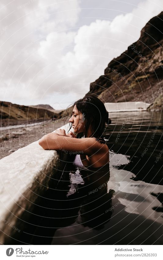 Woman relaxing in hot spring thermal spring Relaxation Tourism Wellness Vacation & Travel Swimming & Bathing Resort Water Therapy Volcanic enjoying Spa Healthy