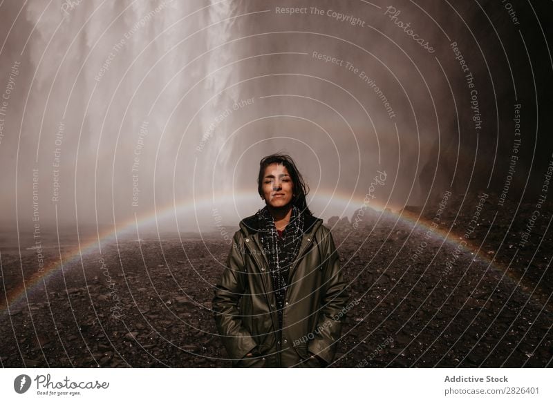 Girl in rainbow of waterfall Woman Waterfall Rainbow Stream Iceland Fog Tourism Mountain Natural Vacation & Travel Landscape Environment Powerful Flow Energy