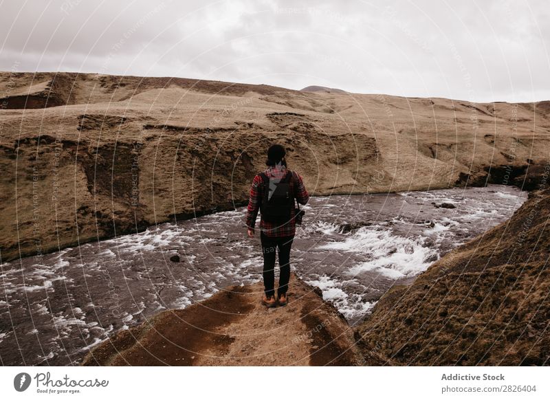 Anonymous man posing on nature Man Rock River Iceland Height Landscape Vantage point scenery Extreme Adventure Tourist Top Nature Stand Wilderness Altimeter