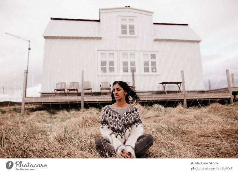 Woman posing on background of house House (Residential Structure) residential Iceland Nature Rural Terrace Home scenery Natural waving hair Landscape Plain Farm