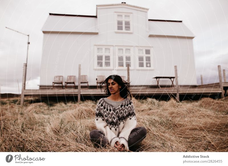 Woman posing on background of house House (Residential Structure) residential Iceland Nature Rural Terrace Home scenery Natural waving hair Landscape Plain Farm