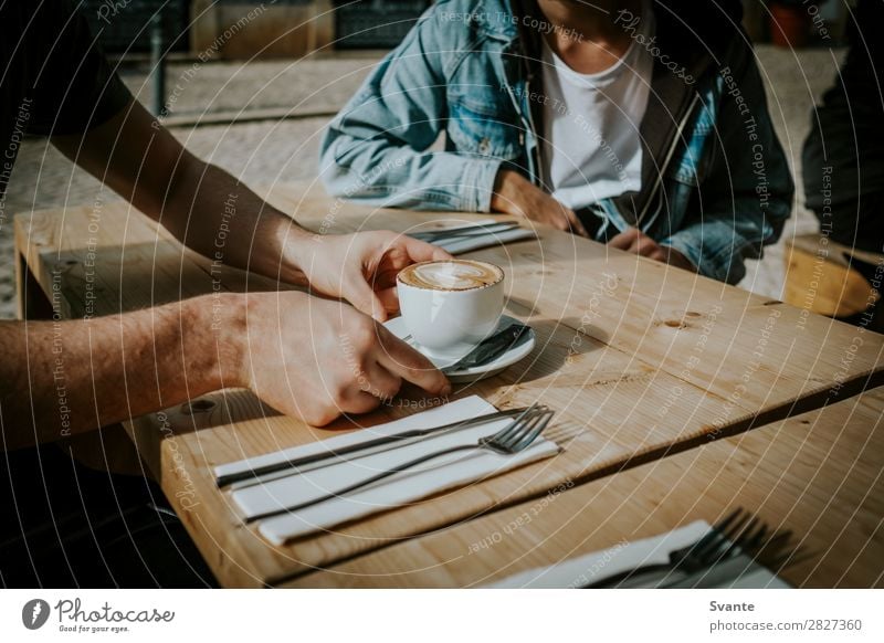 Young man receiving coffee at café Beverage Drinking Hot drink Coffee Espresso Mug Lifestyle Man Adults Group 18 - 30 years Youth (Young adults) Ericeira