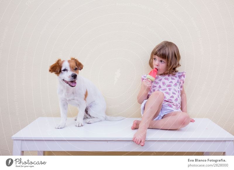 Beautiful kid girl eating a watermelon ice cream Fruit Ice cream Eating Joy Happy Vacation & Travel Summer House (Residential Structure) Garden Child