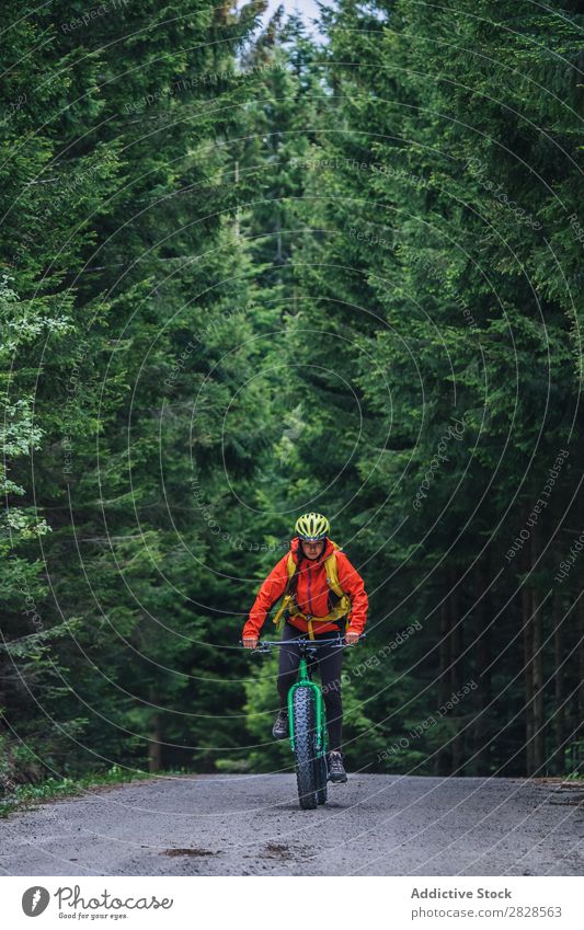 Person riding mountain bike Human being Bicycle Mountain Street Sports Nature Practice Cycling Adventure Motorcycling Lifestyle Relaxation Ride Cycle Action