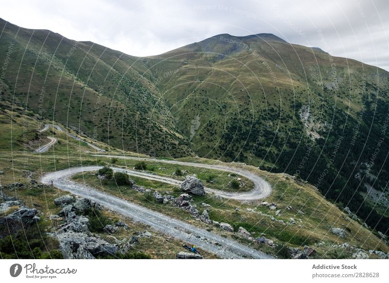 Curvy road in mountains Valley Mountain Street serpentine Landscape Panorama (Format) Mysterious Rural Vantage point Curved Tourism Vacation & Travel Nature