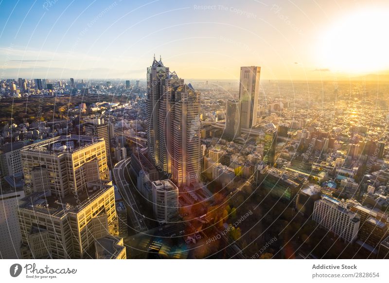 Skyscrapers and city in evening High-rise City Aircraft Skyline Vantage point Town Architecture Downtown Street Building Vacation & Travel Scene Tower Landmark