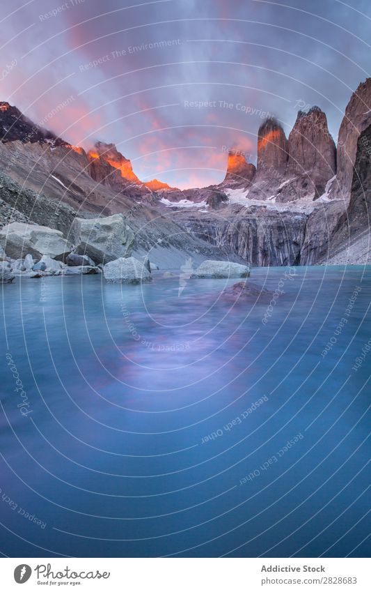 Gray rocky mountains and lake Mountain Lake Frozen Rock Basin silence Freeze Landscape Tourism Panorama (Format) Environment Surface Adventure Deserted Nature