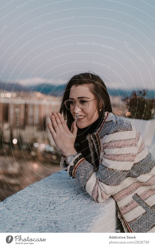 Cheerful young woman leaning on fence Woman pretty Youth (Young adults) Beautiful Fence Lean Town Street Smiling Person wearing glasses Brunette Attractive