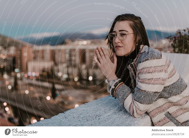 Cheerful young woman leaning on fence Woman pretty Youth (Young adults) Beautiful Fence Lean Town Street Smiling Person wearing glasses Brunette Attractive