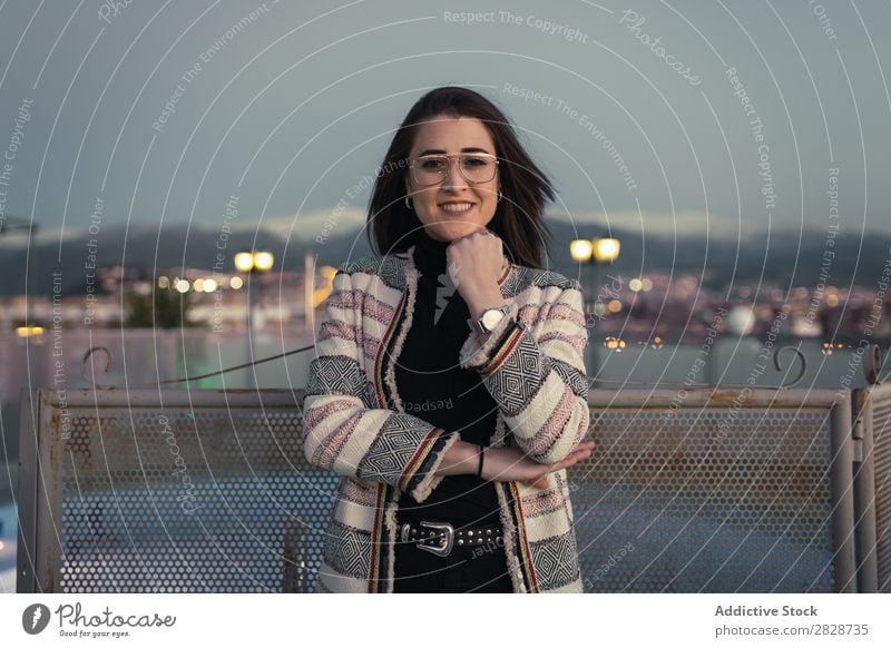 Cheerful young woman looking at the camera Woman pretty Youth (Young adults) Beautiful Fence Lean Town Street Smiling Person wearing glasses Brunette Attractive