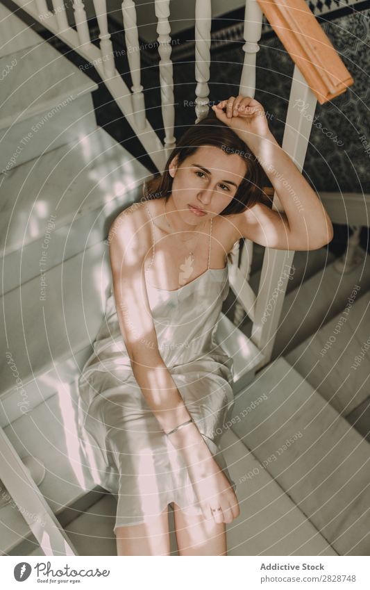 Young sensual woman sitting on stairs Woman pretty Youth (Young adults) Beautiful Foyer Steps Sit Looking up Brunette Attractive Human being Beauty Photography