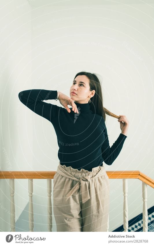 Woman posing near fence pretty Youth (Young adults) Stand Beautiful Cheerful Fence glitters Face Brunette Attractive Human being Beauty Photography Adults Style