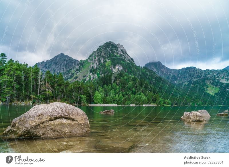 Stones on mountain lake shore Mountain Lake Vantage point Coast Rock Landscape Nature Water Beautiful Vacation & Travel scenery Tourism Green Beauty Photography