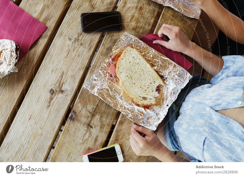 Crop friends having meal while traveling Human being Friendship Traveling Vacation & Travel Café Adventure Eating chatting Lunch Cheerful Summer Food Freedom