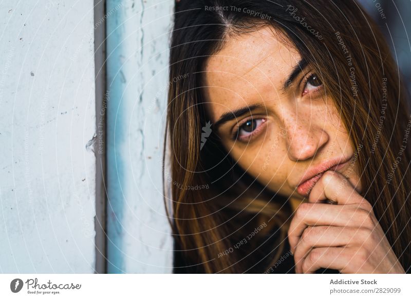 Woman posing in doorway abandoned Building Stand Lean pretty Looking into the camera Dream Pensive Considerate To enjoy Attractive Easygoing Relaxation