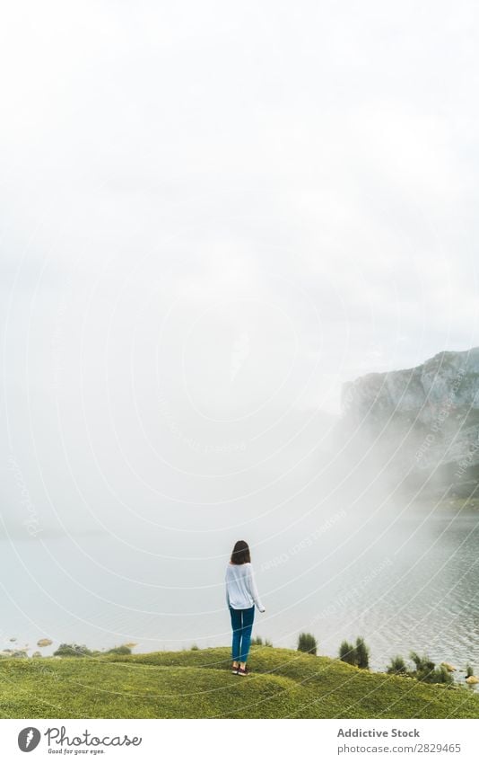 woman standing at mountain Woman Meadow Wind To make dirty pretty Relaxation Nature Field Girl Grass Beautiful Youth (Young adults) Green Spring Human being